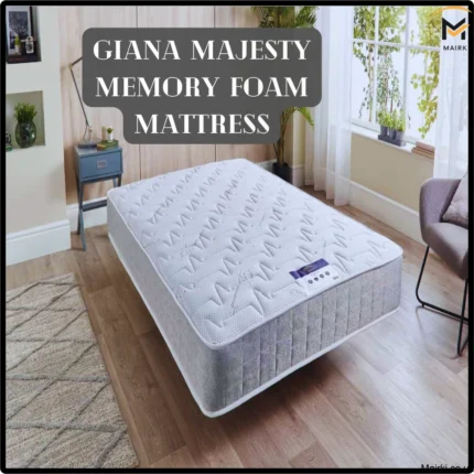 A Giana Majesty Memory Foam Mattress on a wooden floor in a bright, cozy bedroom with a window.