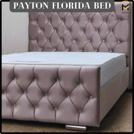 Payton FloridaTaupe-colored bed with diamond-tufted headboard and footboard.