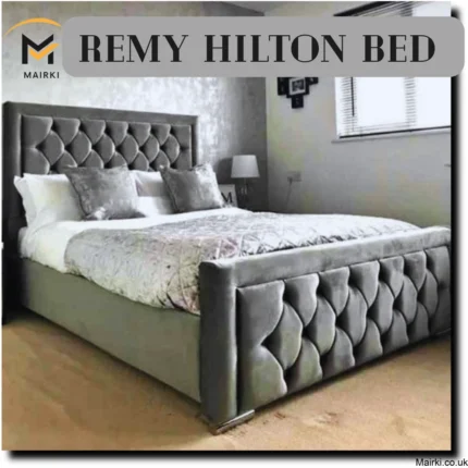 Luxurious bedroom with a diamond-tufted upholstered bed and neutral decor.