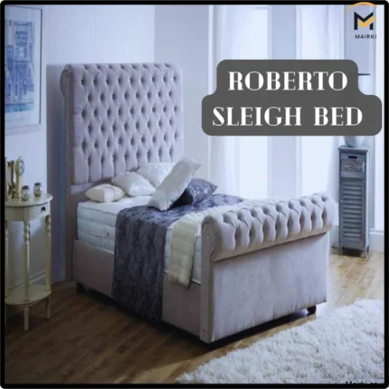 Roberto Sleigh Bed with tufted headboard and footboard in a cozy, well-lit room.