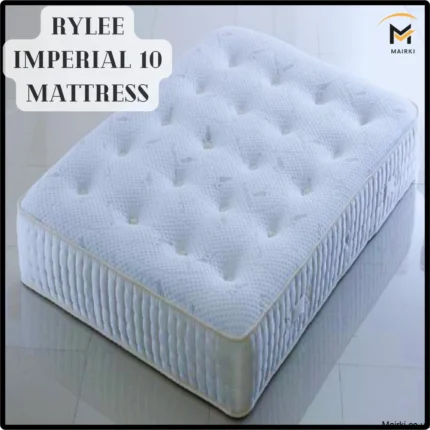 White tufted mattress with edging details on a glossy floor.