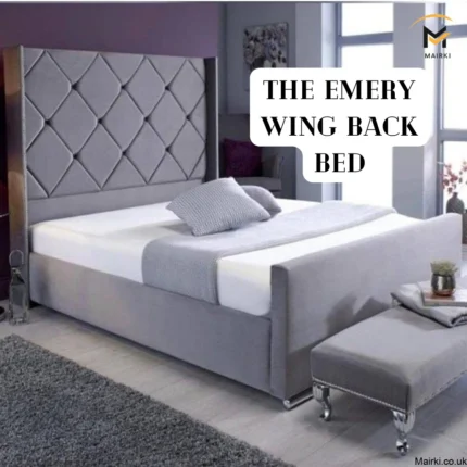 Modern gray upholstered wingback bed with matching bench in a stylish bedroom.