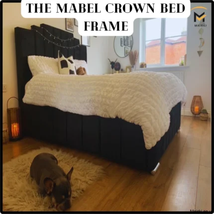 Room with the Mabel Crown Bed Frame, featuring white bedding, a plush headboard, and a French Bulldog on a rug.