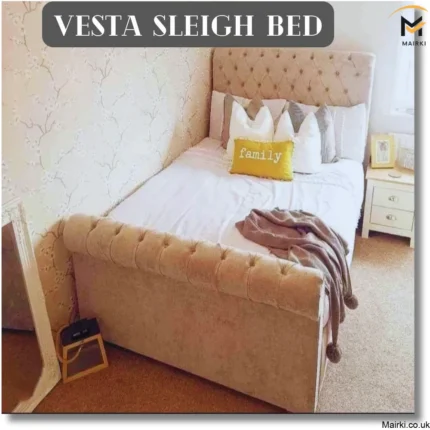 Bedroom with a Vesta Sleigh Bed, tufted headboard, and yellow "family" pillow.