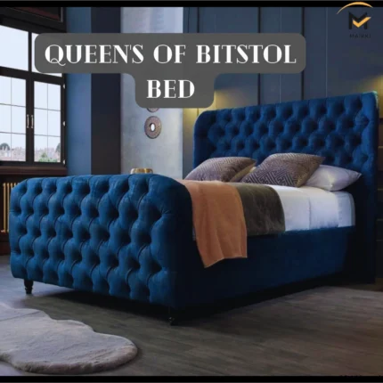 Luxurious blue queen bitstol bed in an elegant bedroom.