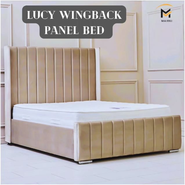 Super king size bed with a beige wingback panel headboard.