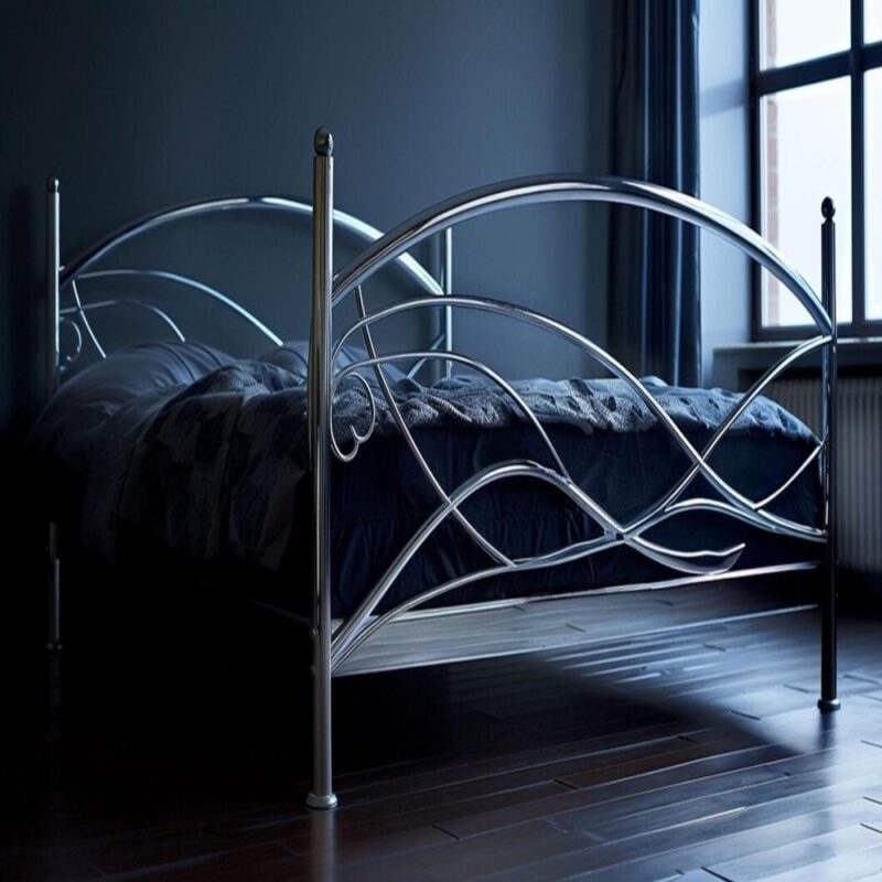 Super King metal bed frame with ornate curved design in a dimly lit room.