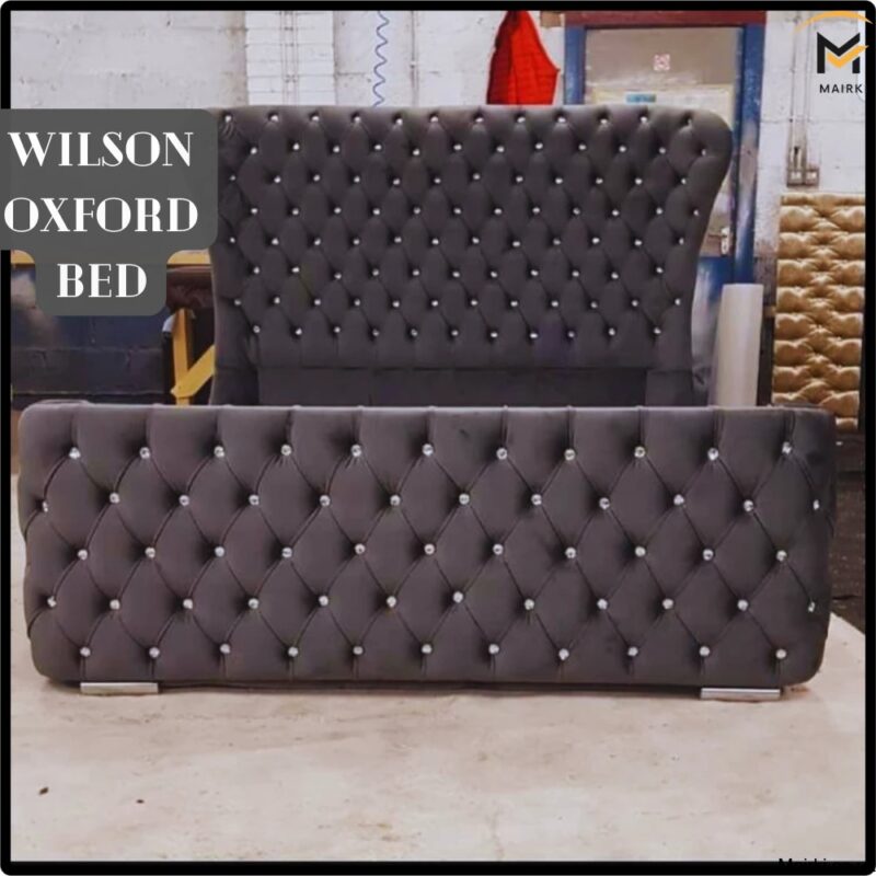 Super King Wilson Oxford Bed with dark gray tufted headboard and footboard.