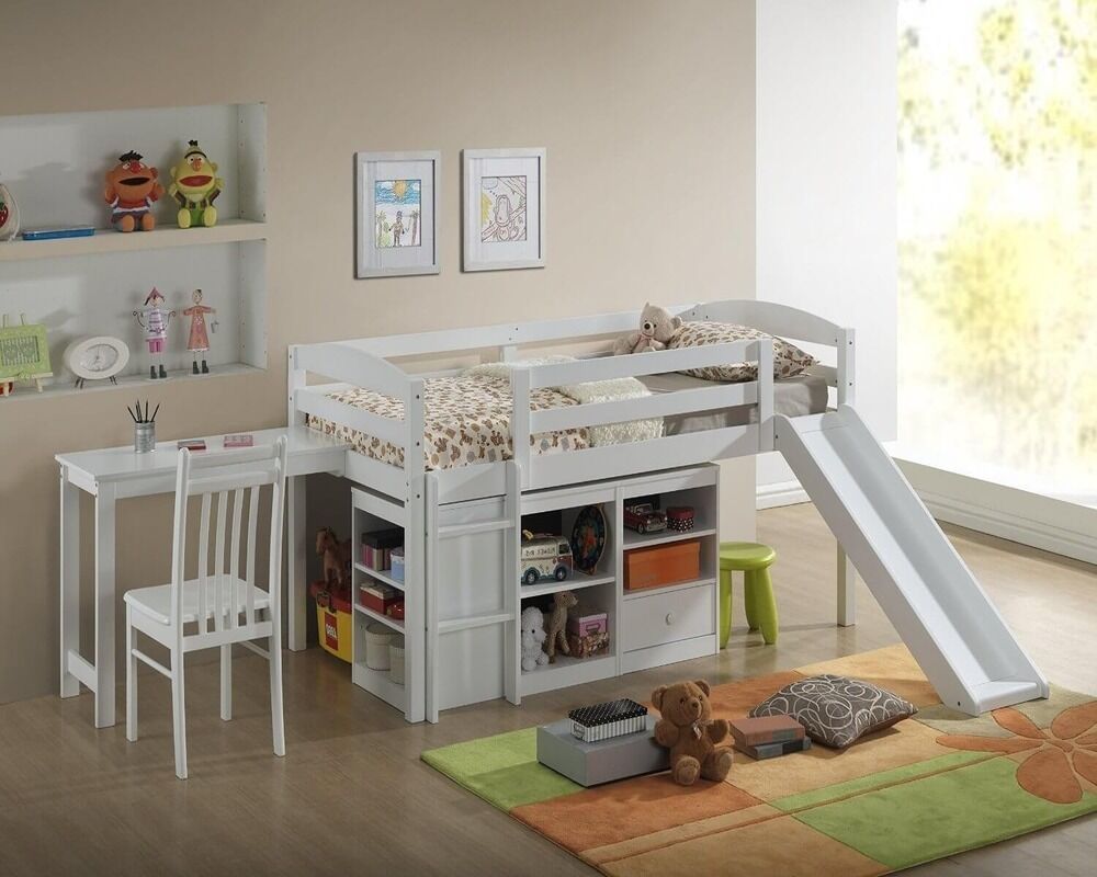 Kids bed with slide, desk, and shelves in a children's room